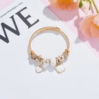 Pulsera Dijes Gato Flor Corona | Brazalete Acero Inox. Color Dorado | Regalo Navidad | Ticotrendy