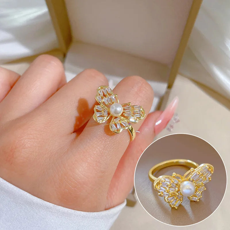 Anillo de mariposa de circón y perla de imitación de lujo ostentoso para mujer, anillo de cobre abierto ajustable de Color dorado, regalos de joyería para fiesta y boda