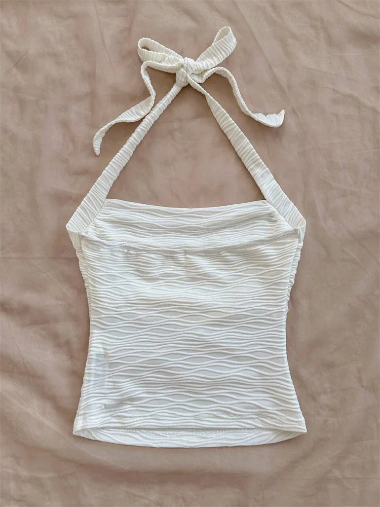 Top corto con cuello Halter de Color liso con diseño de onda para mujer, camisola Sexy con cintura fruncida y espalda descubierta, camiseta sin mangas, ropa de calle Y2k