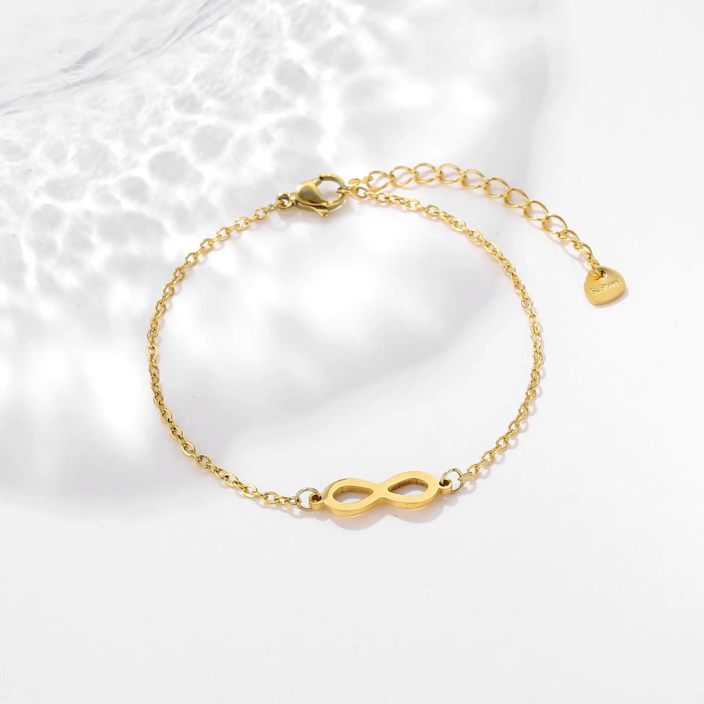 Pulseras con dijes de símbolo infinito de acero inoxidable para mujeres y niñas, accesorios de mano simples, regalos para amantes
