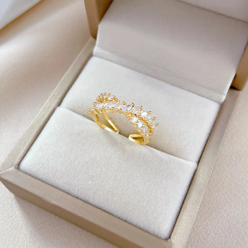 Anillos cruzados de circón de lujo a la moda para mujeres y niñas, anillo de dedo de cobre abierto ajustable de Color dorado, accesorios, regalos para amantes