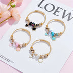 Pulsera Dijes Gato Flor Corona | Brazalete Acero Inox. Color Dorado | Regalo Navidad | Ticotrendy