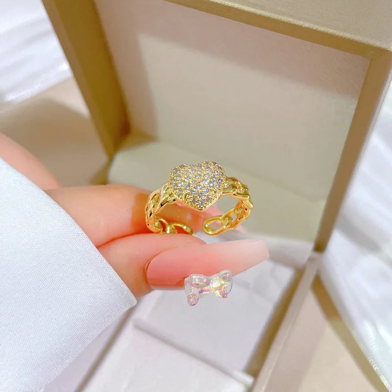 Anillos de corazón de amor de circón ostentoso dulce a la moda para mujeres y niñas, cadena hueca de Color dorado, anillo de cobre abierto ajustable, regalos de joyería