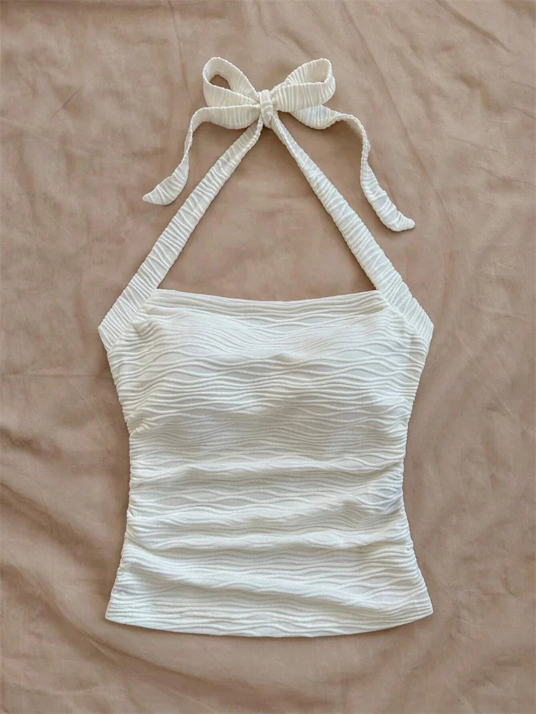 Top corto con cuello Halter de Color liso con diseño de onda para mujer, camisola Sexy con cintura fruncida y espalda descubierta, camiseta sin mangas, ropa de calle Y2k