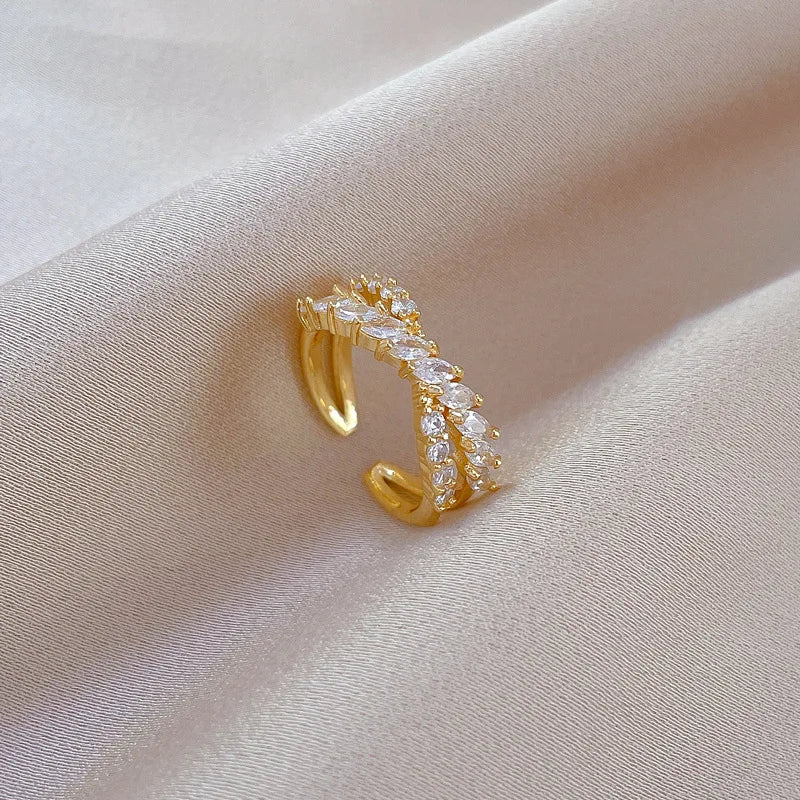 Anillos cruzados de circón de lujo a la moda para mujeres y niñas, anillo de dedo de cobre abierto ajustable de Color dorado, accesorios, regalos para amantes