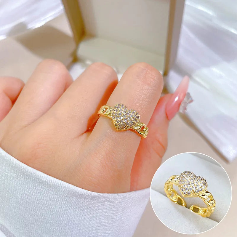 Anillos de corazón de amor de circón ostentoso dulce a la moda para mujeres y niñas, cadena hueca de Color dorado, anillo de cobre abierto ajustable, regalos de joyería