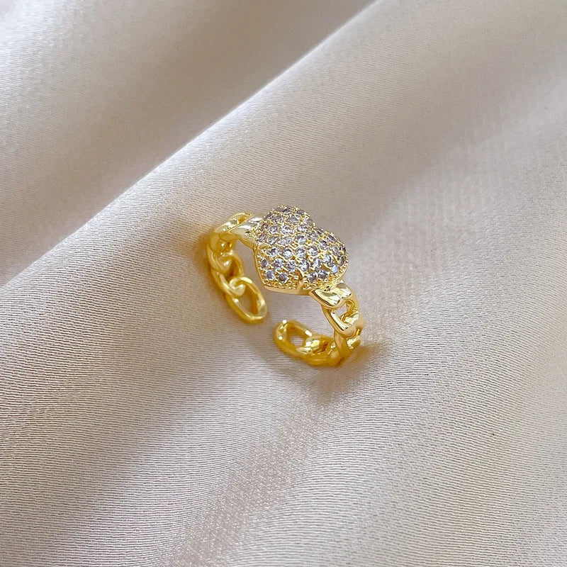 Anillos de corazón de amor de circón ostentoso dulce a la moda para mujeres y niñas, cadena hueca de Color dorado, anillo de cobre abierto ajustable, regalos de joyería