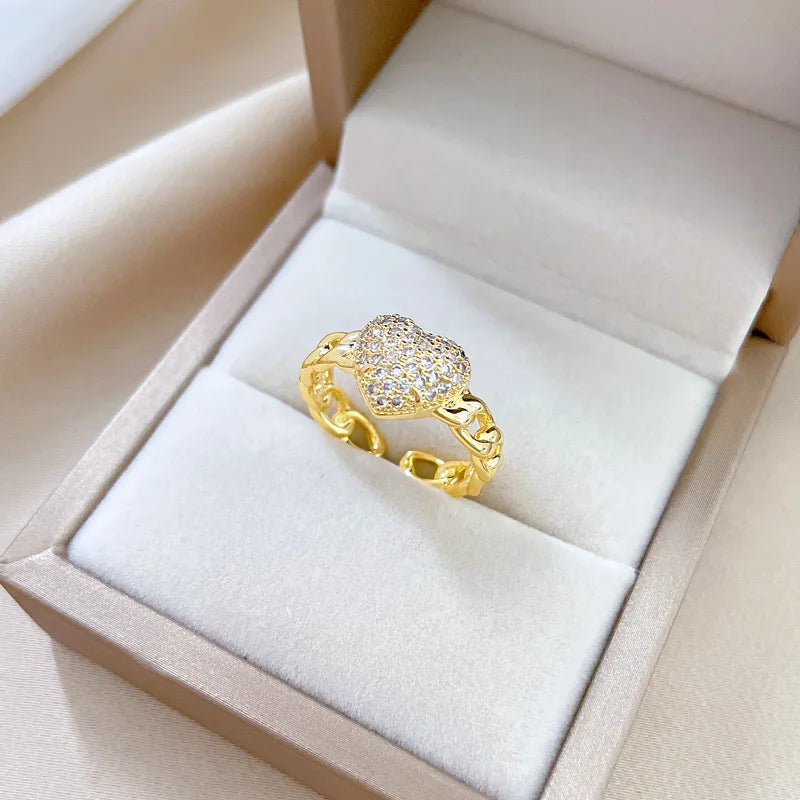 Anillos de corazón de amor de circón ostentoso dulce a la moda para mujeres y niñas, cadena hueca de Color dorado, anillo de cobre abierto ajustable, regalos de joyería